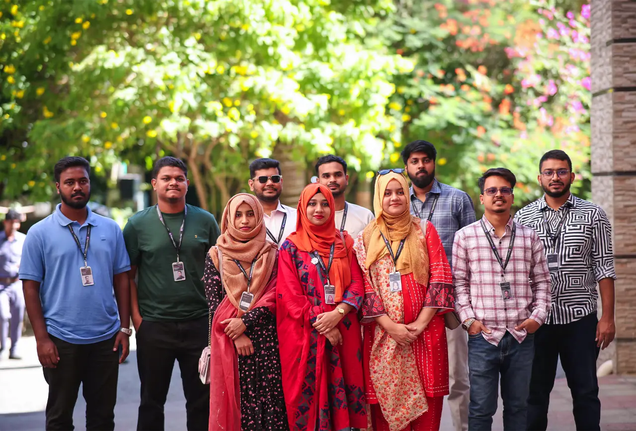 Programming Hero team members standing together outdoors