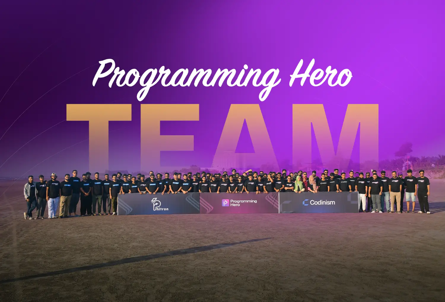 The Programming Hero team lined up on the beach